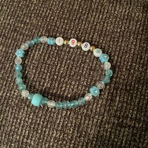 Taylor Swift "1989" bracelet.